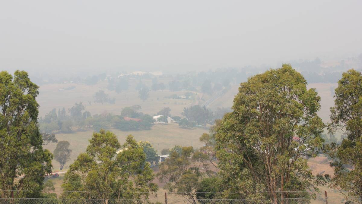 The view from Bega Lookout at lunchtime on Monday. Bushfires in Victoria are causing the blanket of smoke covering the Bega Valley.