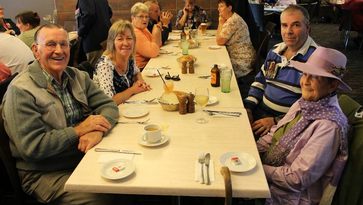 Reg Warn, Mary Lou-Healey, John Wheeler and Mavis Wheeler have lunch at Club Bega on Anzac Day. 