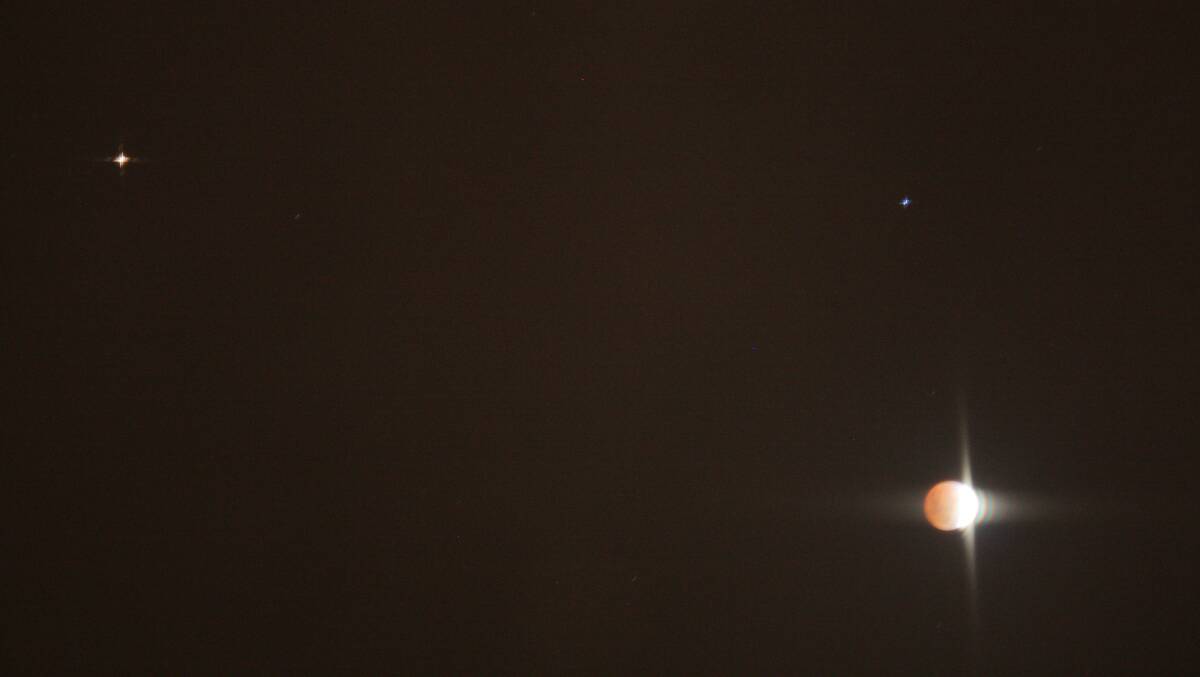 Total lunar eclipse as seen from Bega. The red dot on the left is Mars. Photo Ben Smyth.