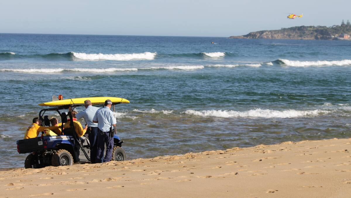 Tathra surf lifesavers, police and the Westpac Rescue Helicopter conduct a search for a young man swept out to sea during a swim at the Bega River mouth in October 2013.