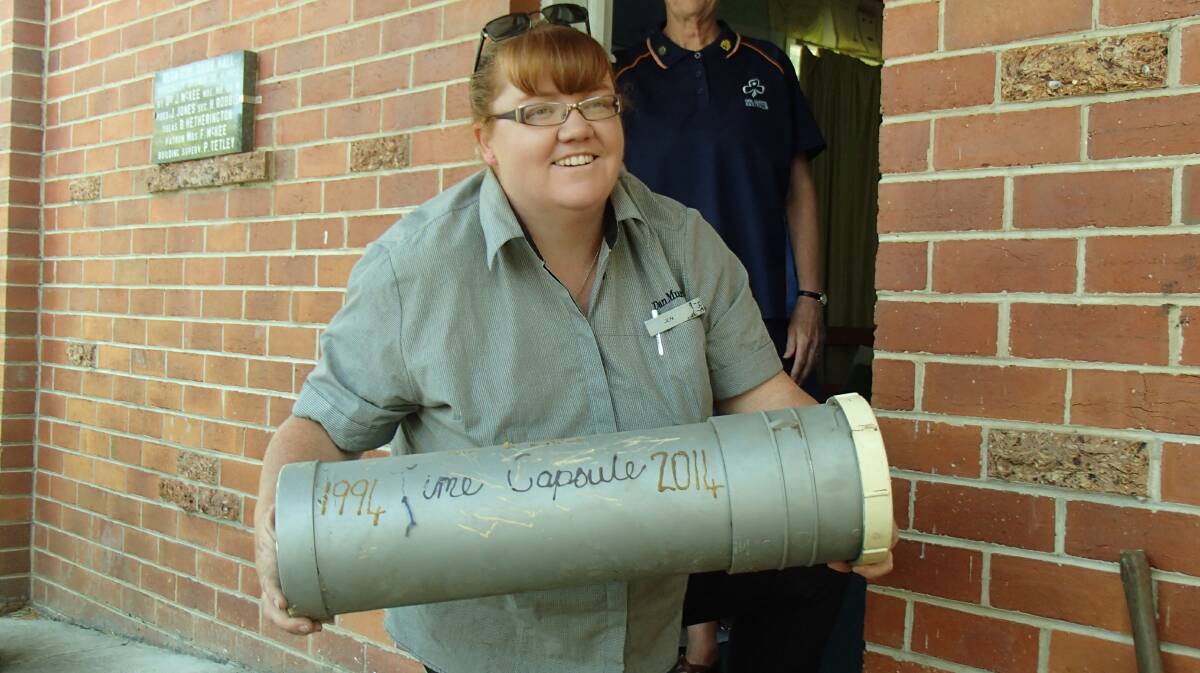 Jen Russell holds the time capsule buried by Bega Girl Guides in 1994.