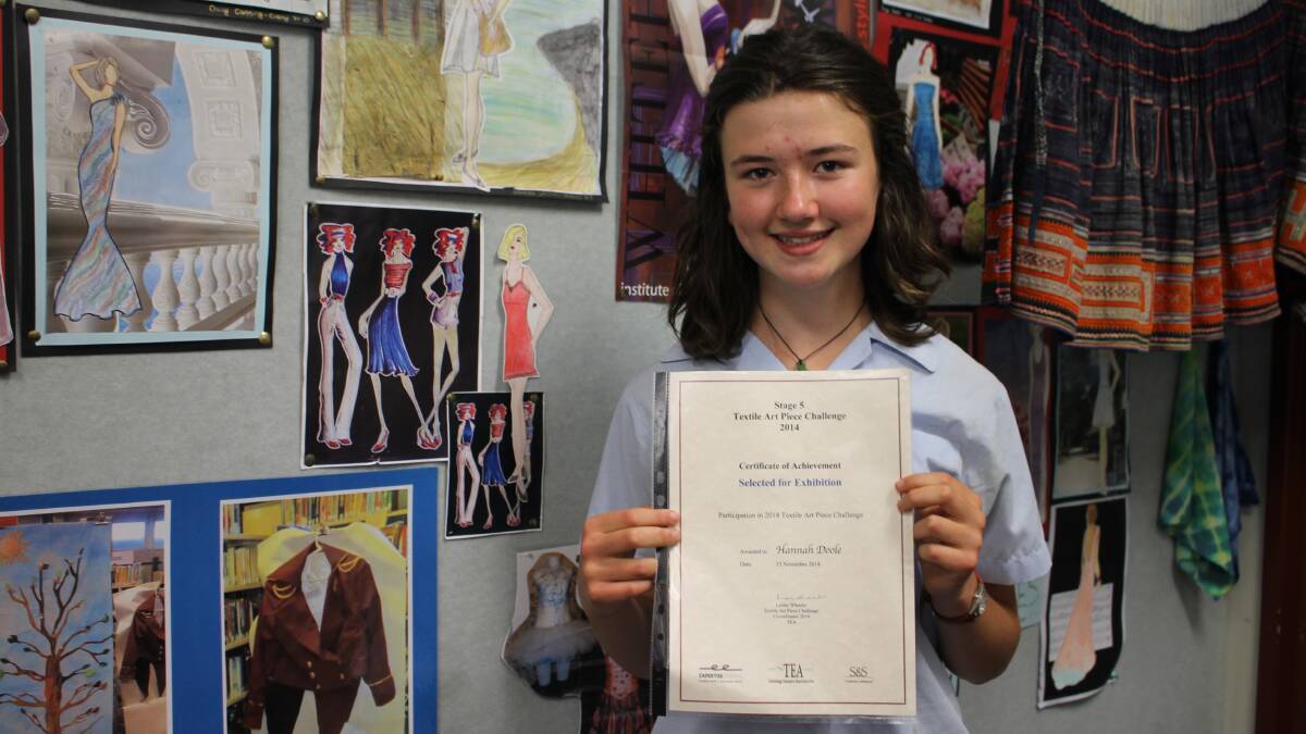 Hannah Doole shows her certificate of achievement for being part of “Texstyle”. 
