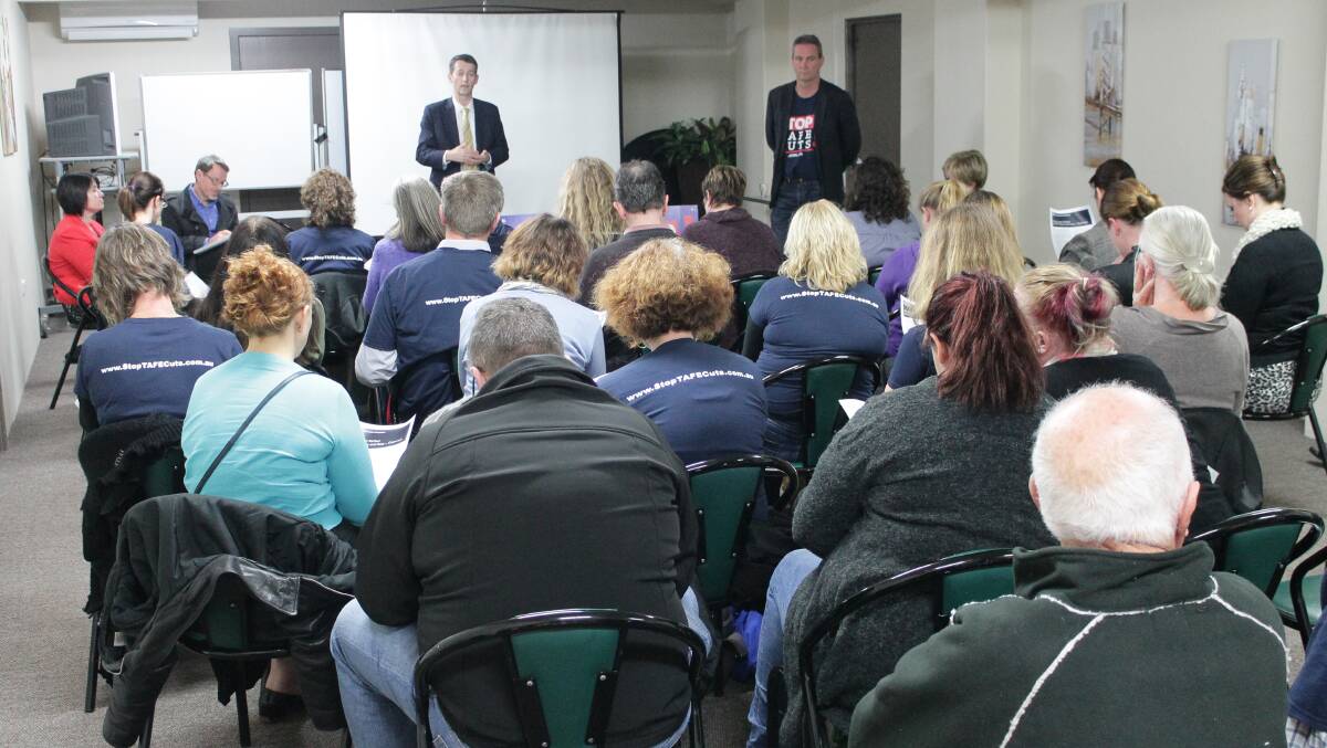 NSW Fair Trading Minister answers questions for the crowd at Tuesday night's community forum in Bega.