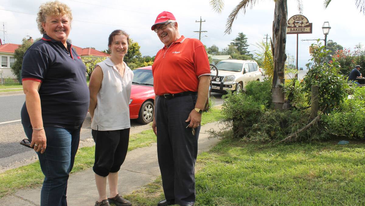 Bemboka business owners Sandra (left) and Andrew Judge, along with Angela Canby, are upset about Wednesday's scheduled five-hour power outage in town.