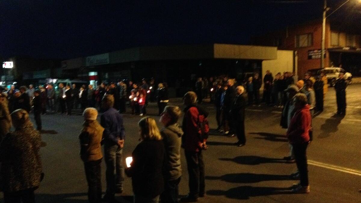A large crowd gathers for the Bega Anzac Day dawn service.