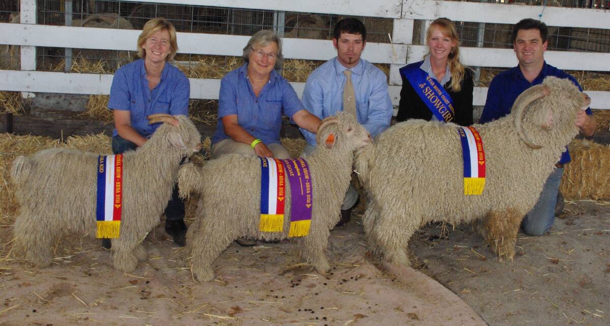 Champion goats (from left) Sue Bell holding one of Helen Ypma’s champion goats, Helen Ypma with the supreme champion Rivers 1201, judge Roland Ross, Bega showgirl Brodie Chester and Nick Gorrie with his champion buck Onlark Ivanhoe.