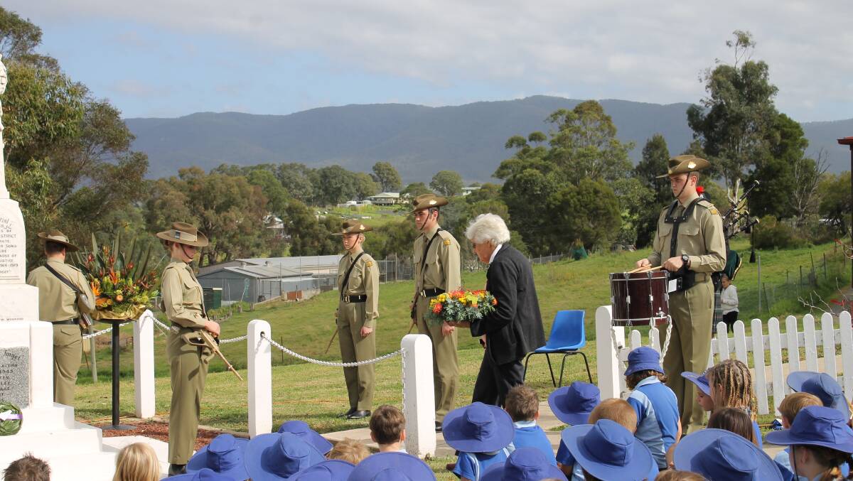 Gwen Robinson lays a wreath on behalf of Legacy at the Bemboka Anzac Day commemorative service.