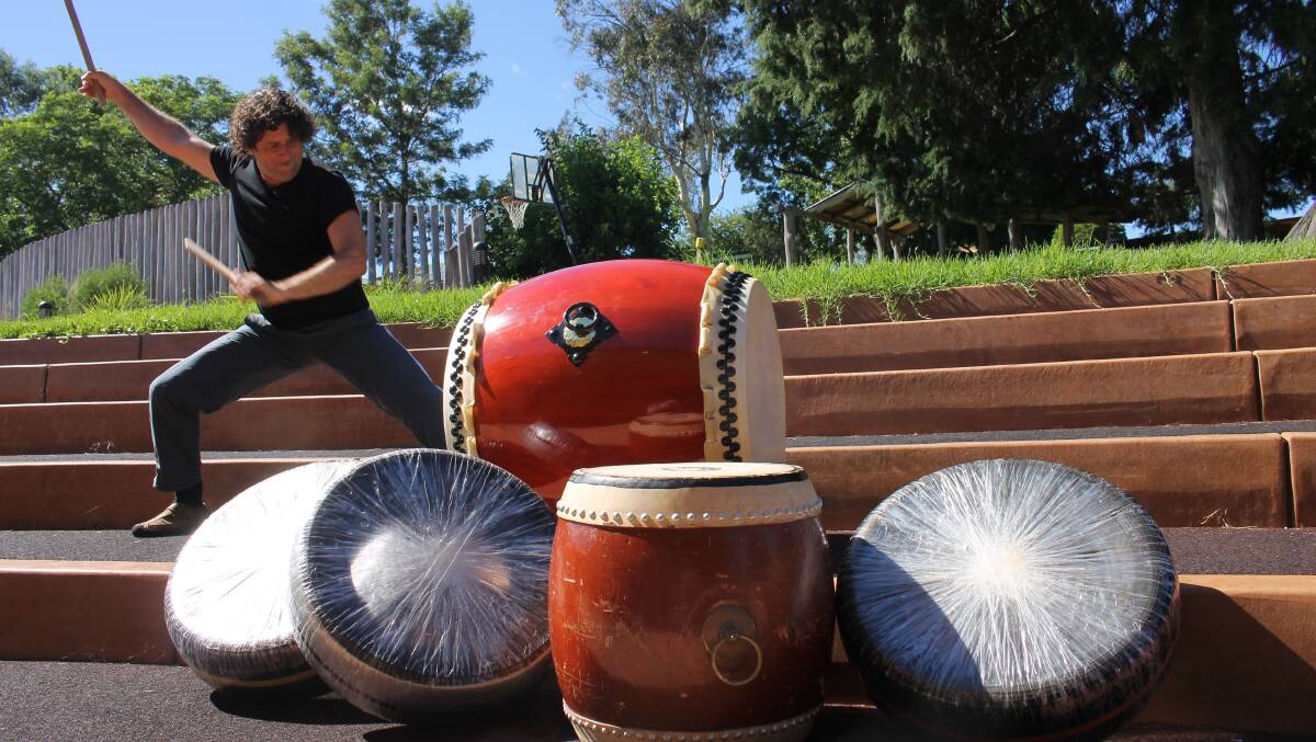 Stonewave Taiko's David Hewitt demonstrates his craft - both on a real drum and ones he "dodgied up" from old car tyres wrapped in sticky tape.