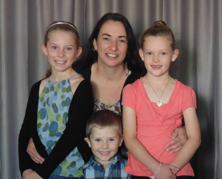 Wolumla’s Irene Trezise – pictured with her children (from left) Tanisha, Dylan and Tegan – is planning on travelling to Russia for treatment for her multiple sclerosis.