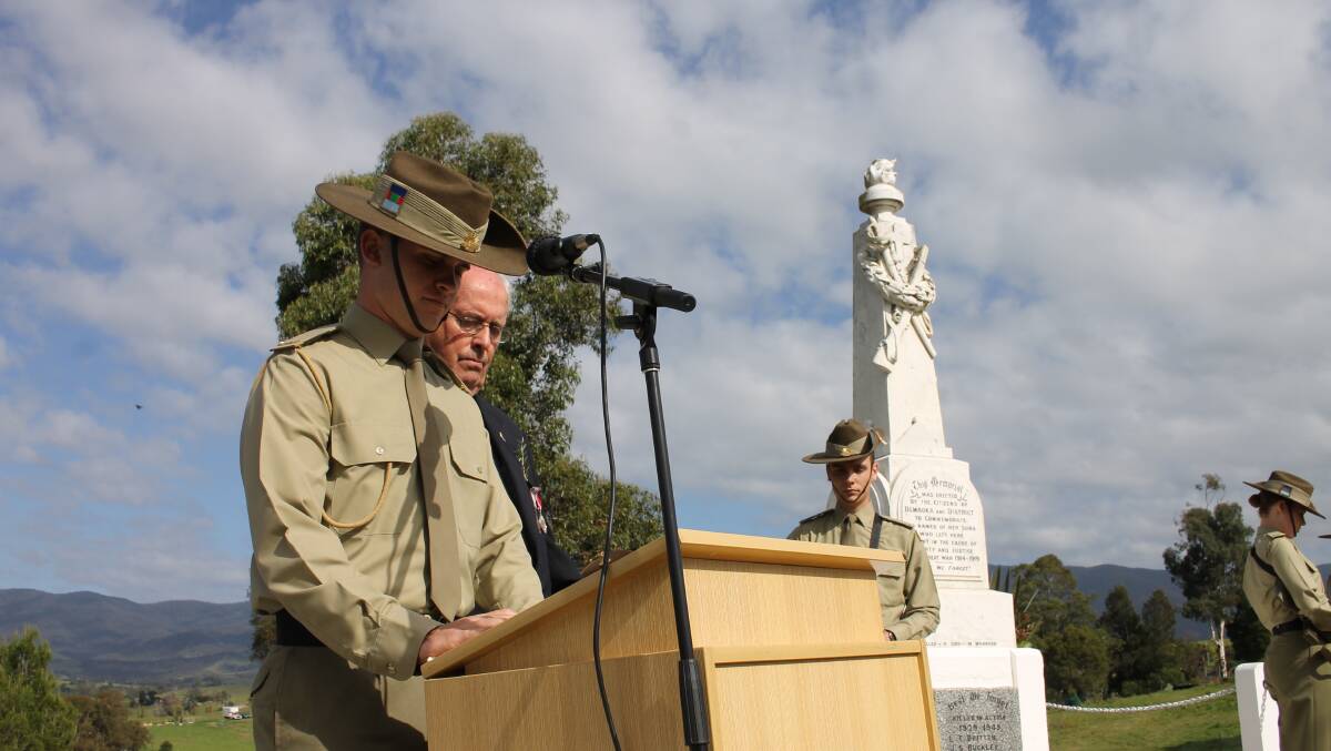 Officer cadet Matthew Sanderson from the Australian Defence Force Academy gives the  Prologue at the Bemboka Anzac Day commemorative service.