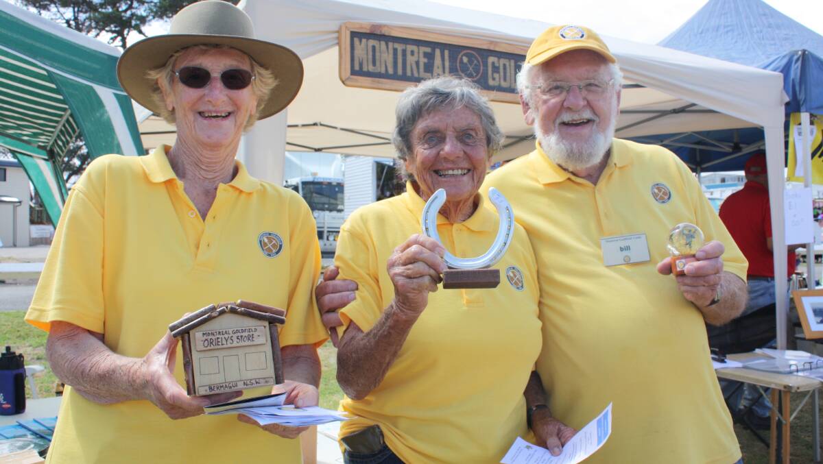 At the Montreal Goldfield booth are (from left) Judi Hearn, Leone Creamer and Bill Shaw.