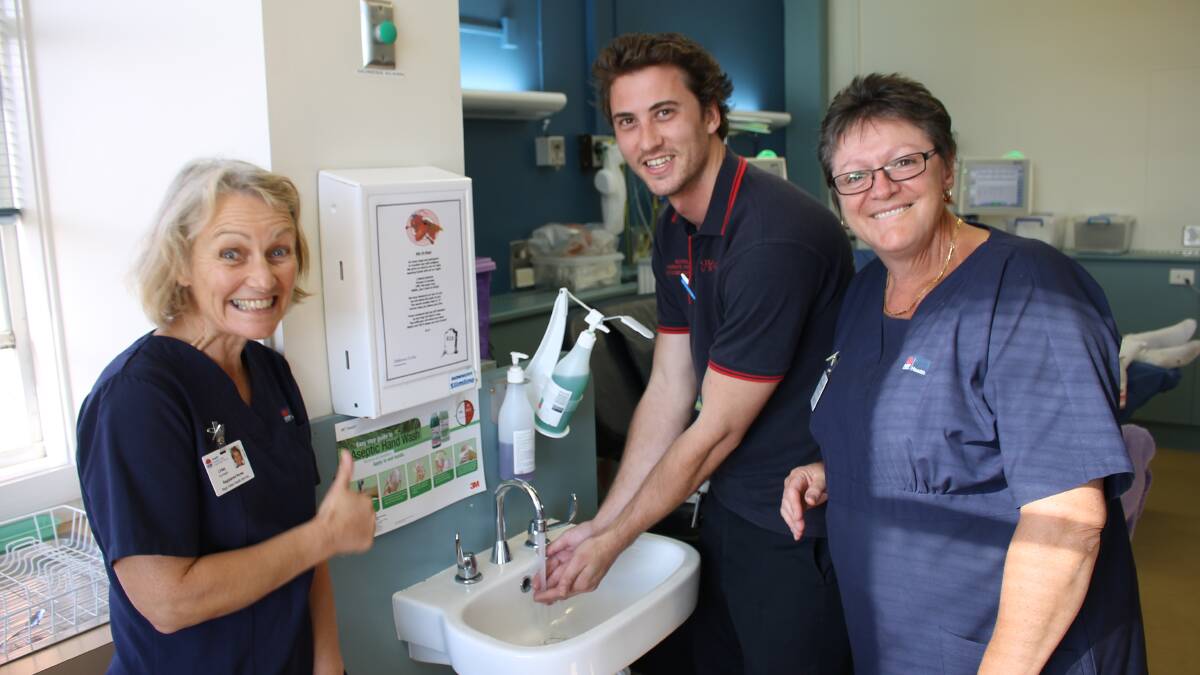 Linley Cormack (left), student from Bathurst Jack Hughes and Ann-Marie Corradini understand the importance of cleaning your hands at the Bega District Hospital.  