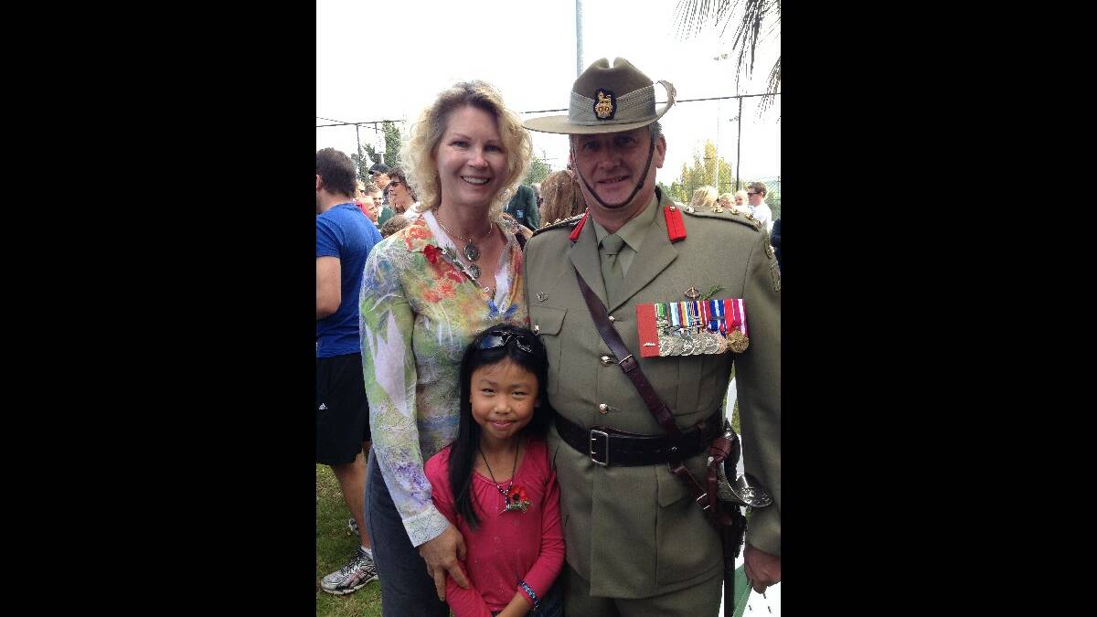 Colonel Michael Rozzoli with his wife Deborah and daughter Kaitlyn.