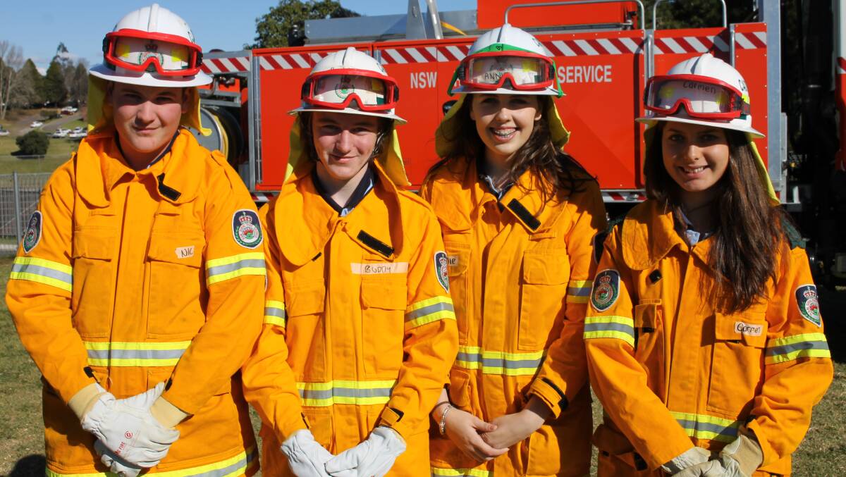 Bega High School Rural Fire Service cadets (from left) Nic Leslaighter, Buddy Gottaas, Annie Fitzer and Carmen MacGregor prepare to demonstrate their firefighting skills on Wednesday. 