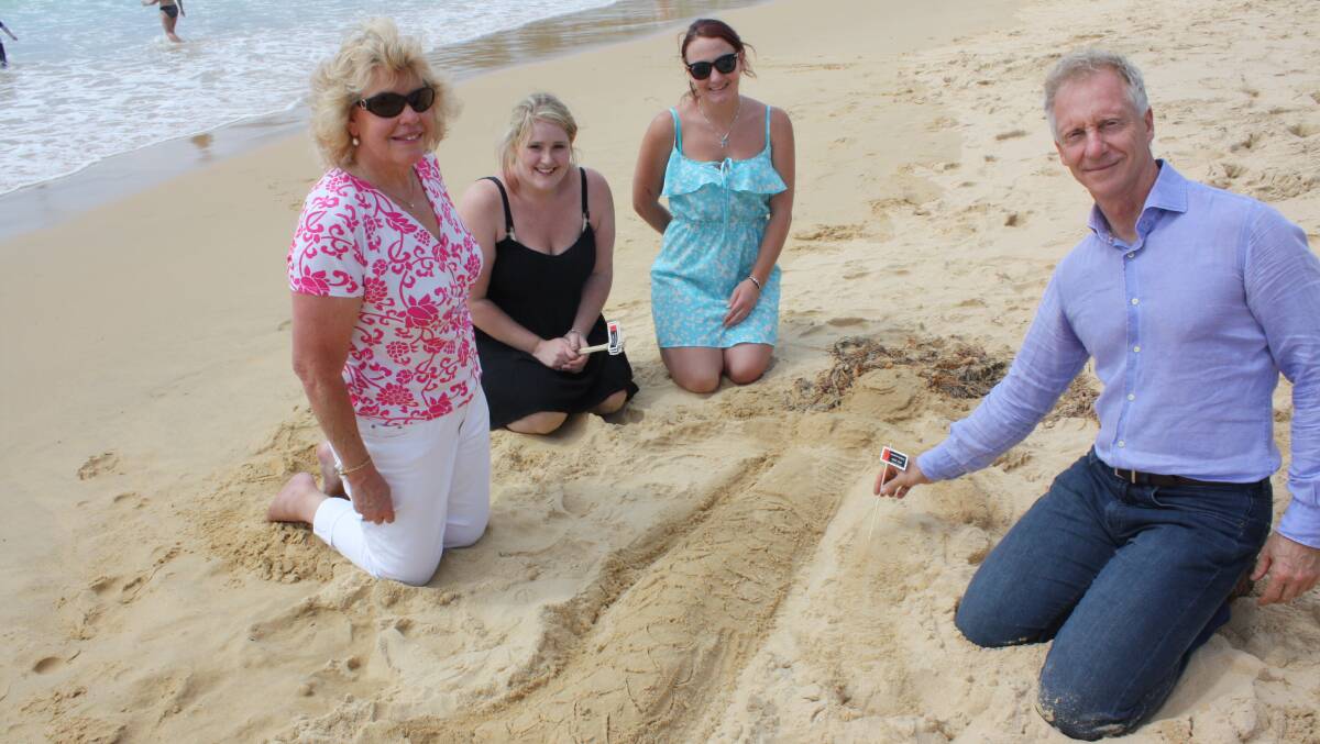 Judging the Seaside Fair sandcastle competition are (from left) Stella Cowen, Amy Edlin, Jess Dale and Rob Tacheci.