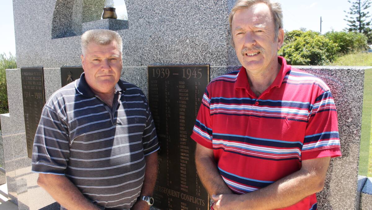 Bermagui RSL sub-branch members, including president Neville Staehr (left) and secretary Roy Davies, are calling for any names that could be missing from the Bermagui War Memorial. 