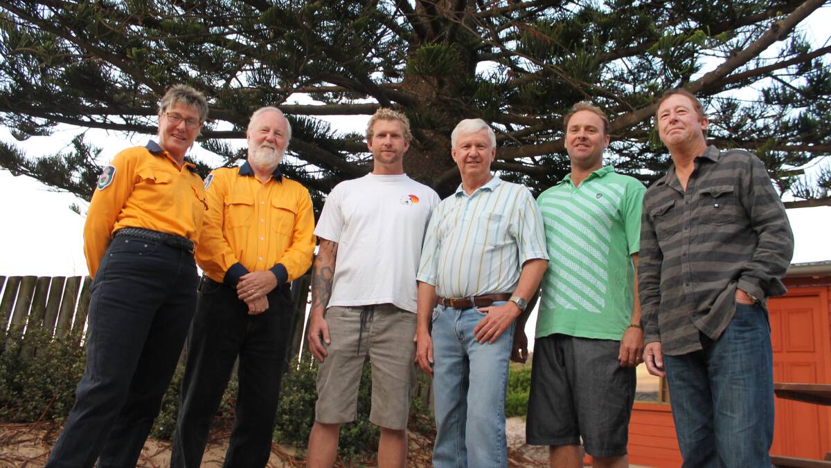 At Friday’s presentation are (from left) Lorraine Taylor and Anthony Taylor from the Tathra Rural Fire Service, Tathra Sunshine Club president Michael Clark, Dave Greenland from Tathra Landcare, Sunshine Club vice-president Craig Waugh and life member Mick Green.