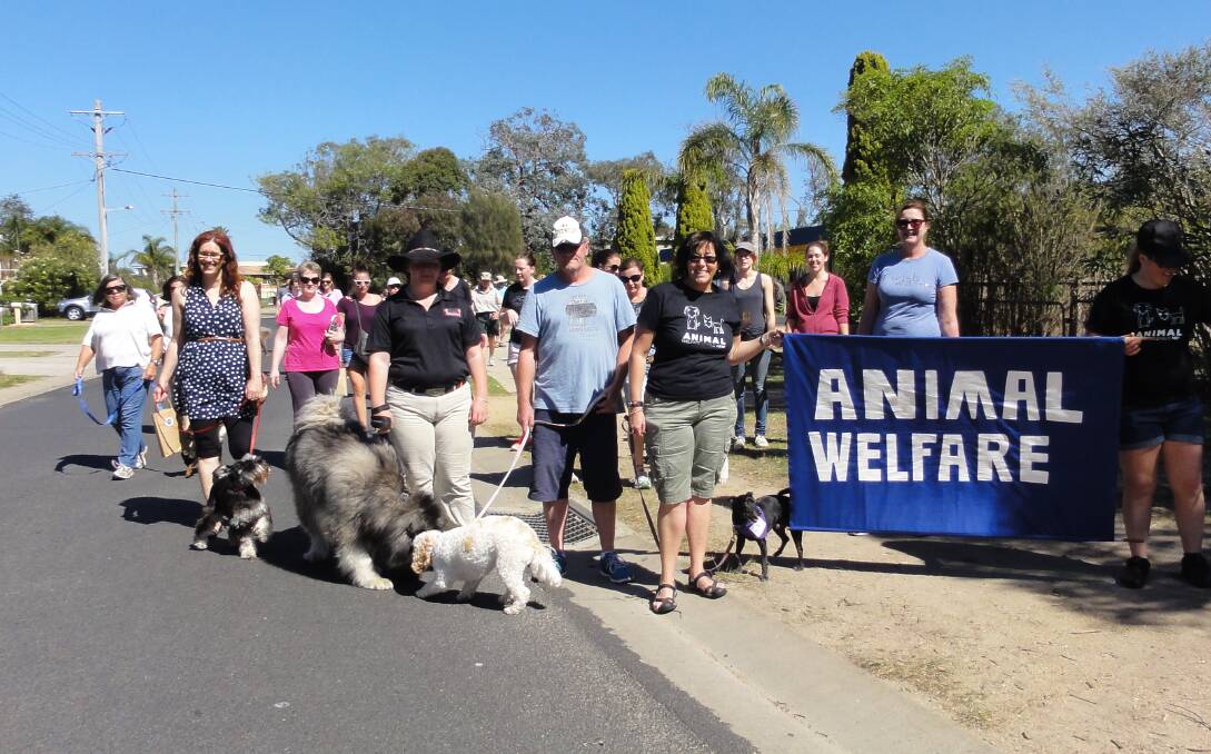 Participants march during the Animal Welfare League Far South Coast branch dog-themed fundraiser last October.