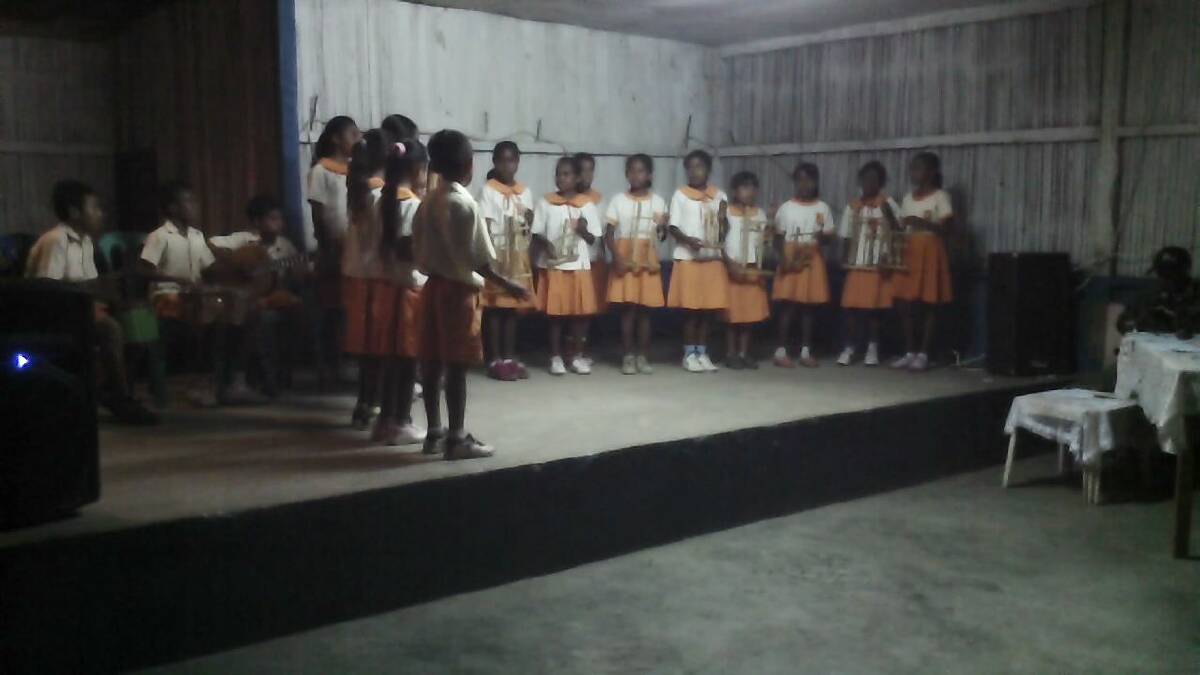 A school choir sings in Timor Leste. 