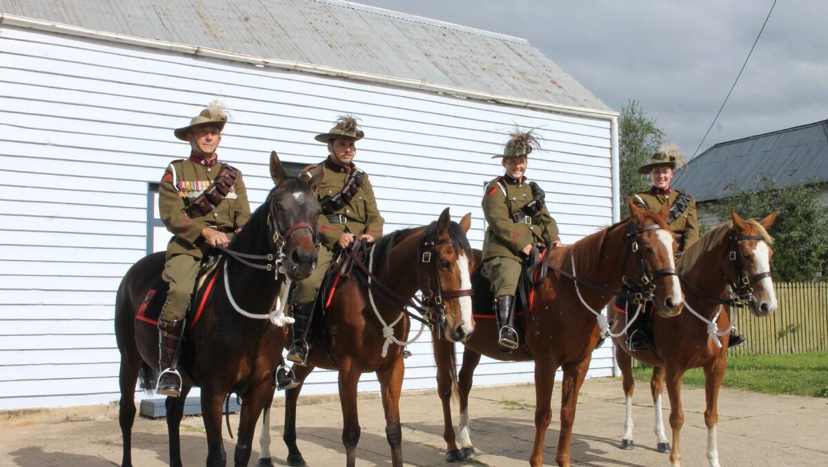 Members of the Bemboka 7th Light Horse regiment get ready for the parade (from left) troopers Mick Symons, Wal Berman, Daena Saye and Kristyn Hayman. 