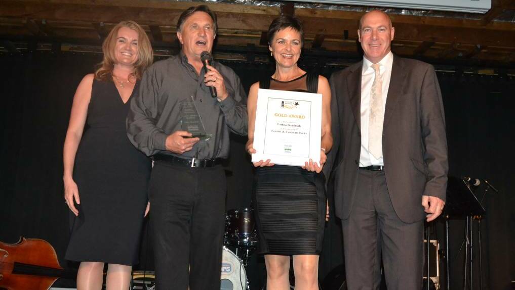Frankie J Holden and Michelle Pettigrove from Tathra Beachside receive the gold medal for the tourist and caravan parks category at last week’s South Coast Tourism Awards.
