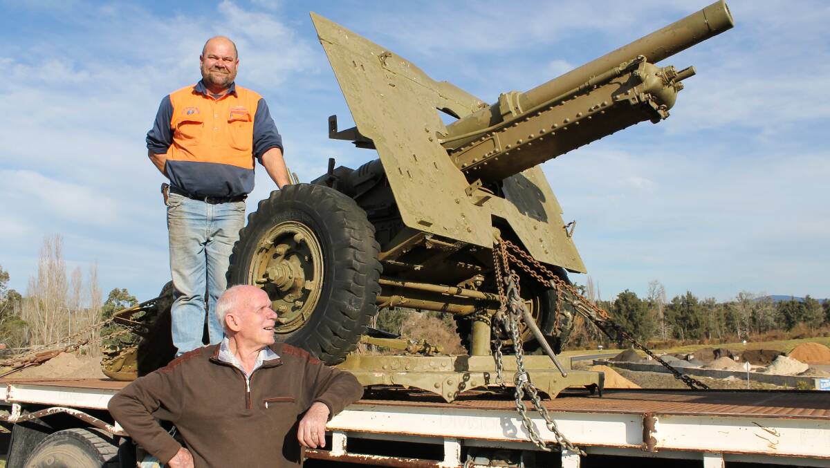 Peter Moore from Peter Moore Welding and Bega RSL sub-branch president Barry Stoney check over the 25-pounder from the Bega Memorial Gate.