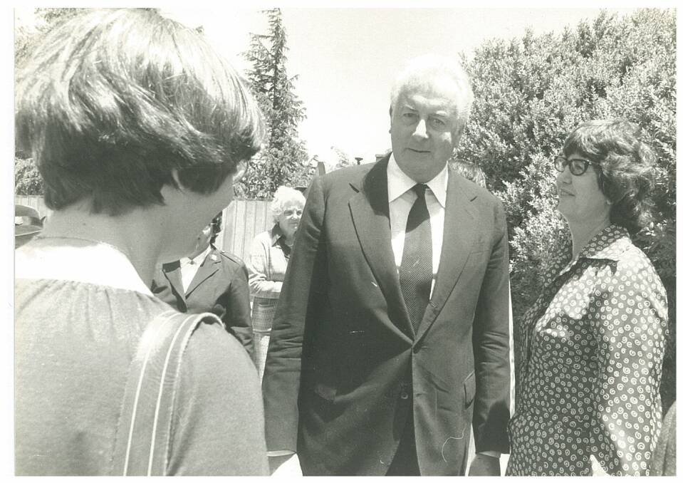 Claire Lupton speaks with Gough Whitlam in front of St Andrew's Presbyterian Church, Canberra, after the 1978 funeral of Claire's father, the Right Reverend Hector Harrison.