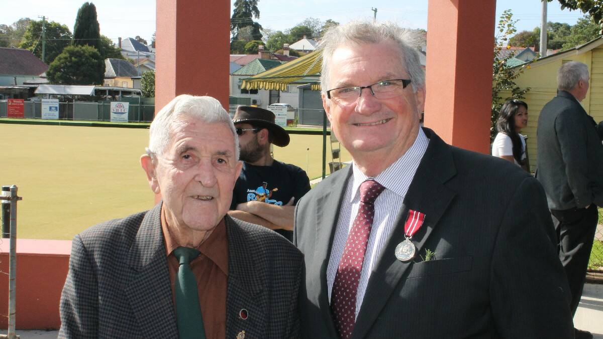 WW2 veteran Stan Tetley (left) with Ross Taylor at the start of the Anzac Day parade. 