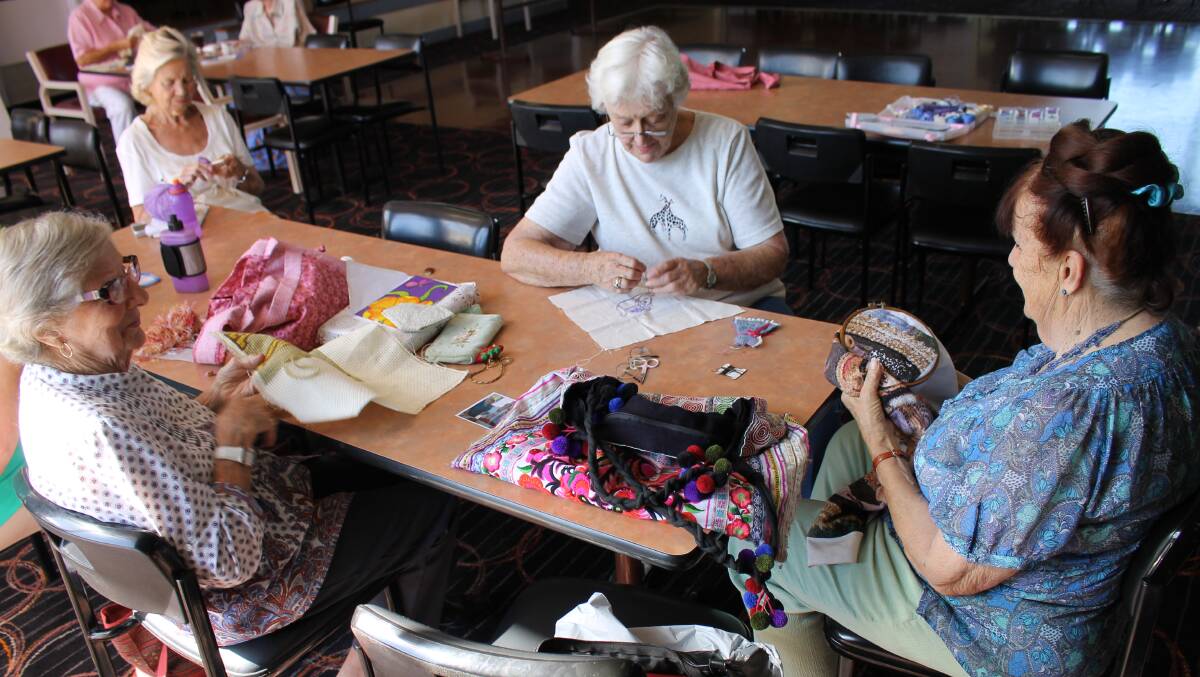 Joy Reynolds (left) enjoys chatting as well as knitting with Winsome Salway and Angela Vasey.