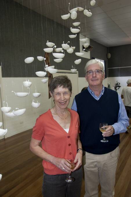 Dr Jenny Wray and Jock Munro of Bermagui with "Ghossel Boats 1" by Pauline Balos