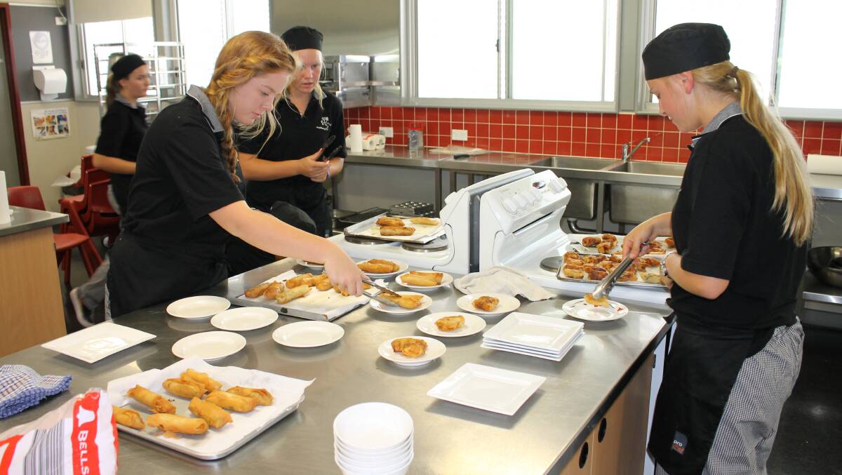 Dishing up yum cha specialties on Friday are Bega High School Year 12 hospitality students (from left) Melinda Holzhauser, Emily Nawiesniak and Jarrah Kennedy.