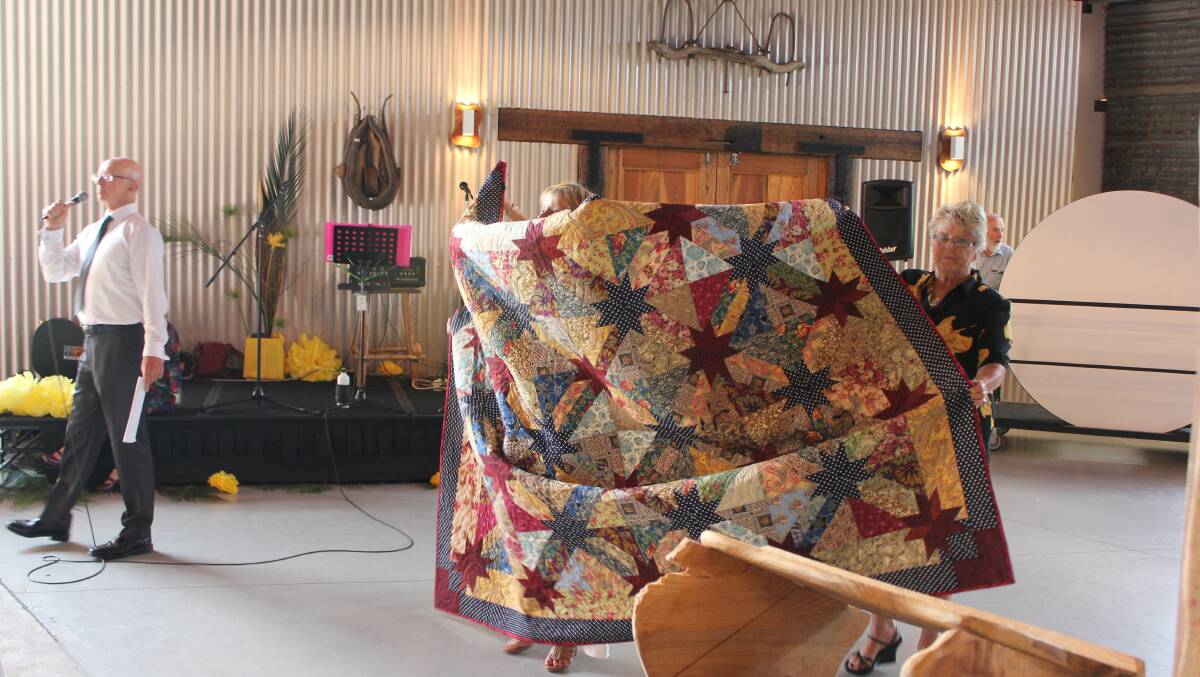 This beautiful handmade quilt sold at the Can Assist for $580, the highest fetching item. 