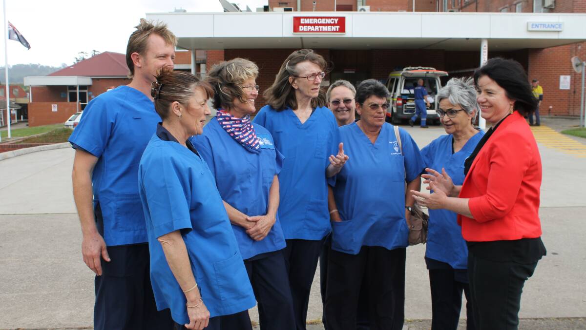 Labor candidate for Bega Leanne Atkinson (right) speaks about the effect a GP co-payment could have on hospital emergency departments with local nurses including (from left) Patricia Hegedus, Alex Woodger, Diane Lang, Sally Rersher, Pamm Smith, Noeline Bell and Carmen Mataic. 