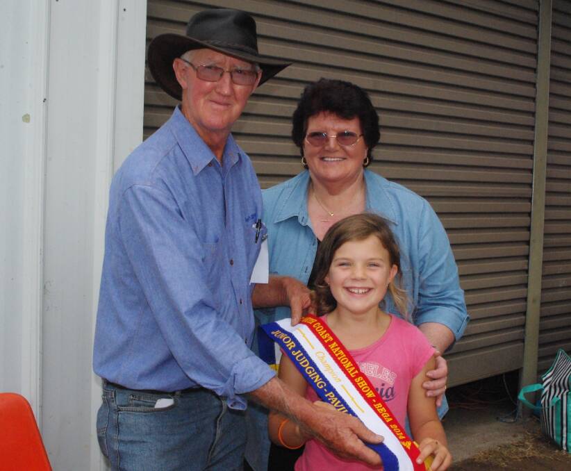 Calissa Badullovich, champion junior judge in the Rural Youth competition, is congratulated by judge Peter Wilton and organiser Sue Mitchell-Davis.