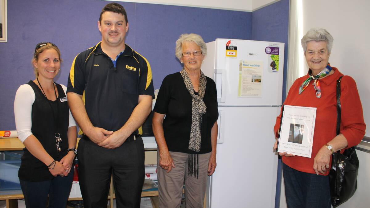 With the new fridge essential to Bega Valley Primary School’s Breakfast Club are (from left) Sally Bendyka, Chris Halligan, Helen Slater and Daphne Sweeney. 