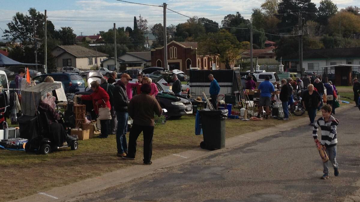 Bargain hunters browse the many stalls at Saturday’s Bega Pre-School car boot sale.