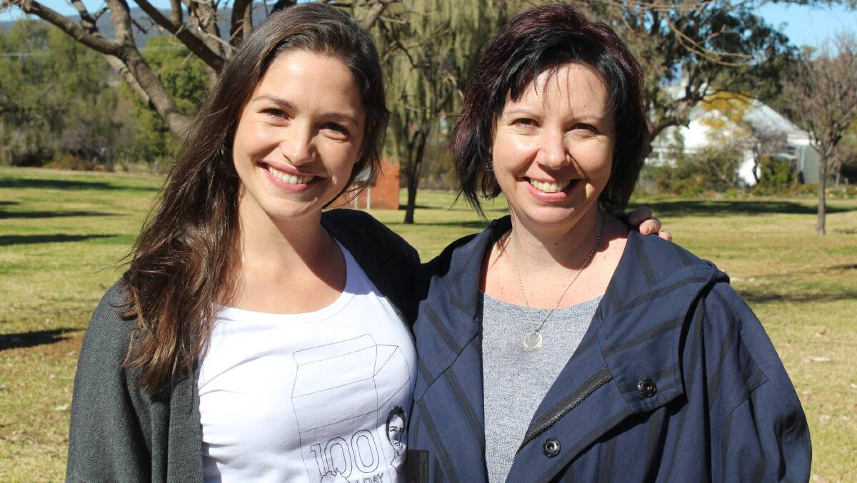 Missing Persons Advocacy Network founder and CEO Loren O’Keeffe (left), and Merimbula author Melissa Pouliot catch up the inaugural Picnic for Missing in Quirindi, NSW last August.