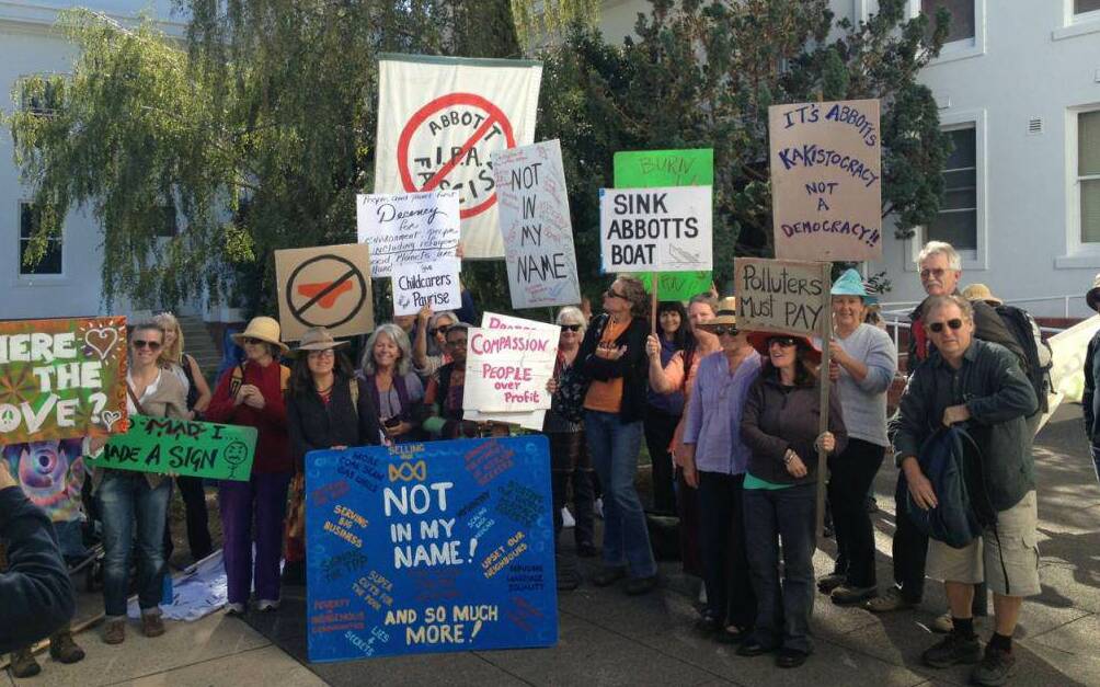 Bega protesters with signs made their way to Canberra on Monday for the March in March.