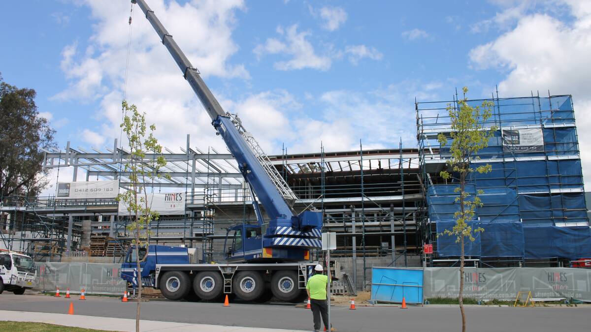 A crane has been busy placing steel girders in place as the Bega Civic Centre takes shape.