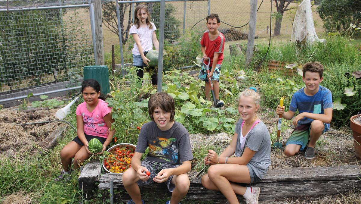 Excited to work in the Tanja Public School garden are pupils (front, from left) Tayla Green-Aldridge, Blue McGrath, Mirri Dalziel, Willow Conroy, (back) Ebony Constable and Luke Jenson.