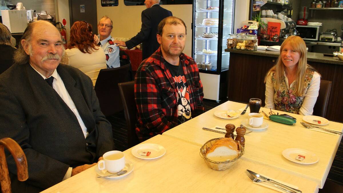 Rocky Macalister (left), Dave Harrison and Red dine at Club Bega on Anzac Day. 