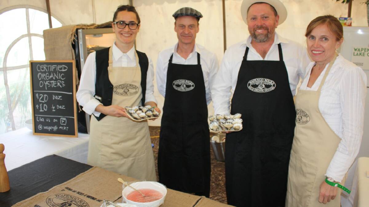 Serving Wapengo Oysters are (from left) Ozlem Guler, Brenton Lynch, Shane Buckley and Draga Jevtic at Four Winds Festival 2014. Photos: Ben Smyth