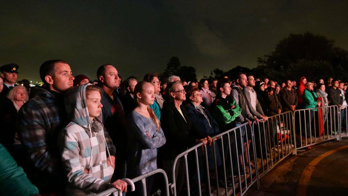 NEWCASTLE: The crowd at the Nobbys beach dawn service. Photo: Jonathan Carroll, The Newcastle Herald. 