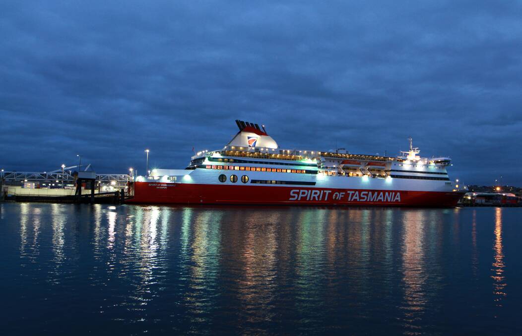 A 20-year-old man has been arrested while allegedly trying to carry a weapon and ammunition on to the Spirit of Tasmania passenger ship in Devonport on Tuesday night.