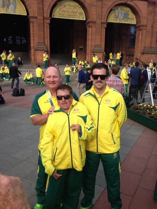 Tathra lawn bowler James Reynolds (centre) with Para Triples team-mates Tony Bonell and Tim Slater in Glasgow as Australia prepared for the opening ceremony on Wednesday night. 