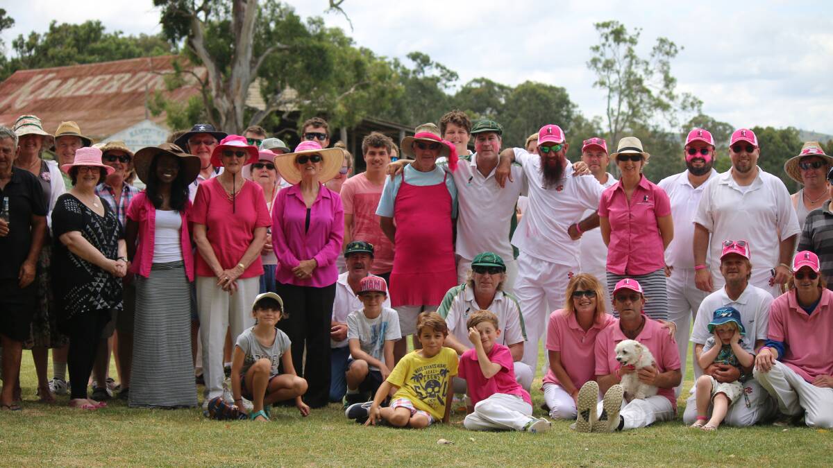 • The crowd joins teams on the field ahead of a Pink Stumps Day cricket match to support the McGrath Foundation at Lord’s View Oval, Kameruka, on Saturday. 