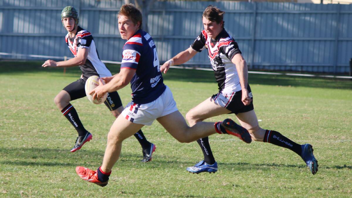 Bega Rooster Ryan Apps shapes for an offload against Cooma last weekend. Apps joined fellow Group 16 players as part of the Greater Southern Stars rep side in Forster. 