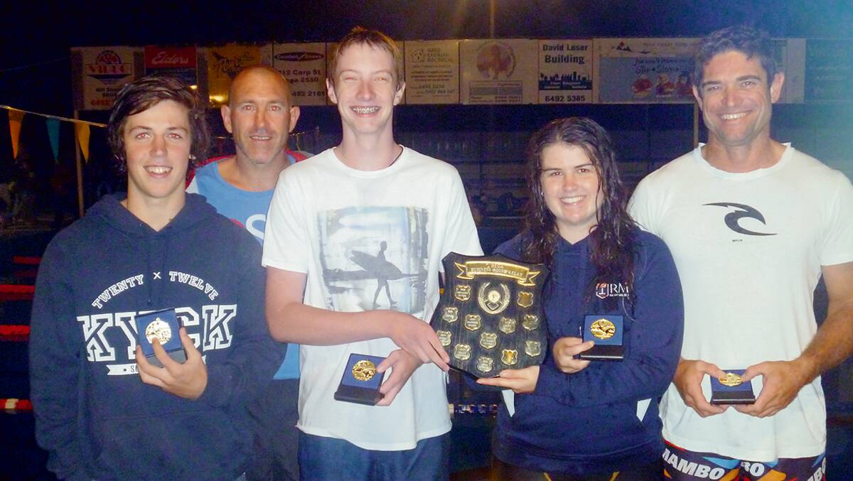 • Bega Amateur Swimming Club member Darrell Parker (second from left)  presents trophies to the winners of the business house relay (from left) Jake Duchesne, Daniel Smith, Amanda Brice and Mark Philipzen.