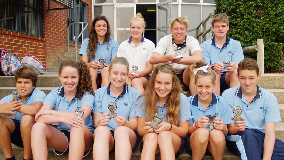 • Delighted trophy winners at the Bega High School’s recent swimming carnival are (back, from left) Millie Boyle, Emily Nawiesniak, Jesse Hoyland, Jack Robbers, (front) Lyndon Paratene, Keira Hoyland, Elyse Philipzen, Ellie Parker, Malak Butchers and James Pearce.
