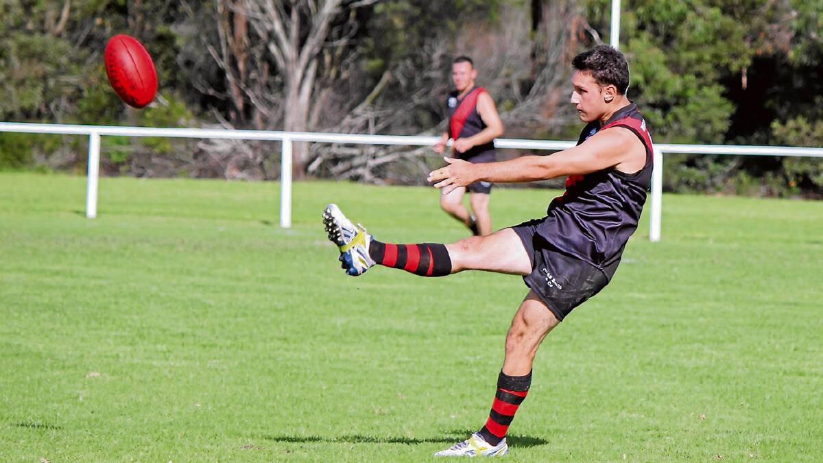 • Bega Bomber Mitch Bucholtz takes a long kick against the Merimbula Diggers recently.
The Bombers will play the Tathra Sea Eagles in an Anzac weekend clash.  